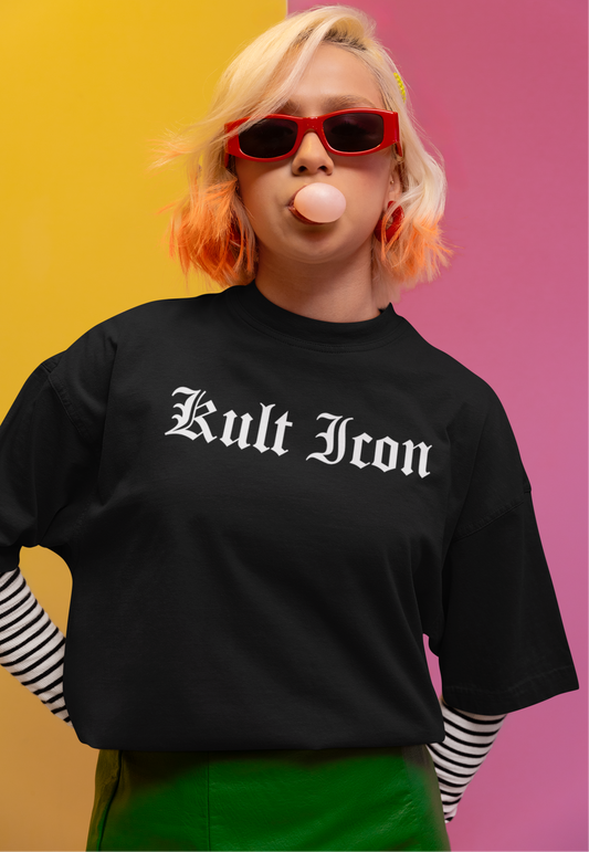 Person wearing a black 'Kult Iron' t-shirt with a colorful background