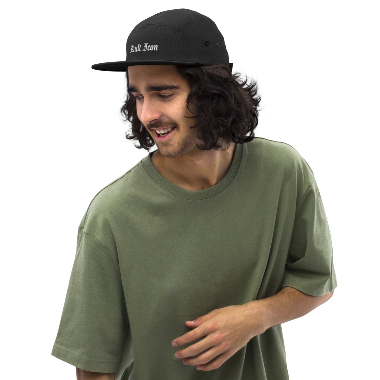 Man wearing a black cap and green t-shirt on a white background