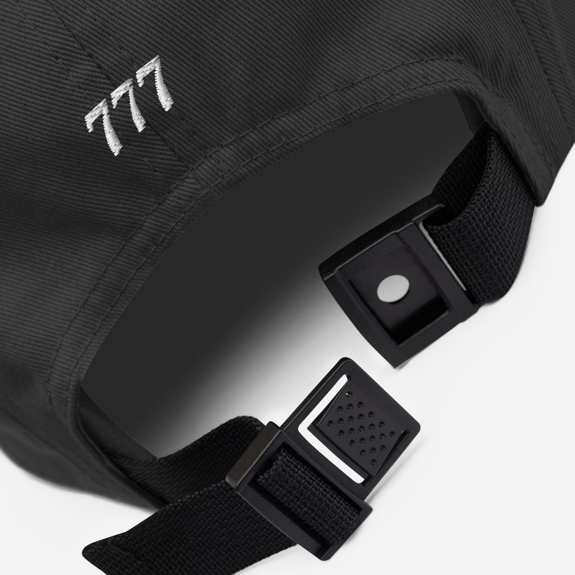 Black bag with a visible brand logo on a white background