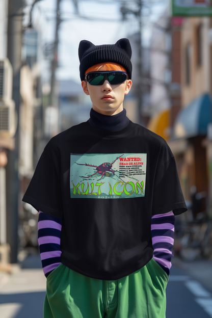 Person wearing a black turtleneck with a graphic design, green pants, and a black cat ear hat on a street.