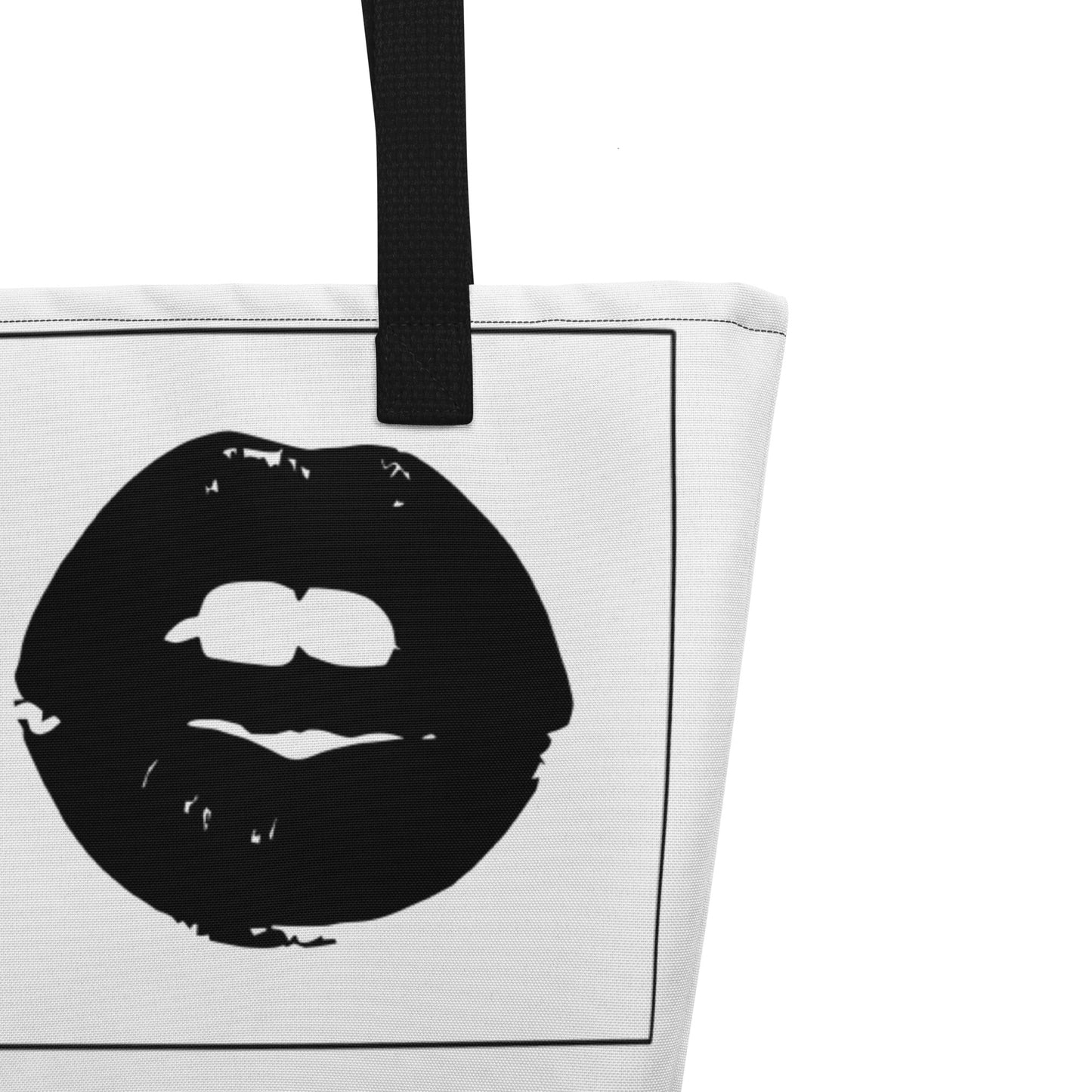 Tote bag with black lips design on a white background