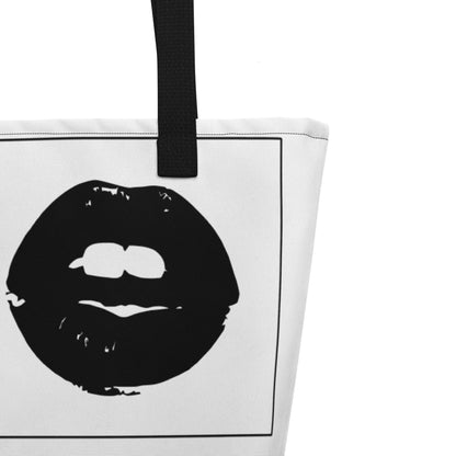 Tote bag with black lips design on a white background