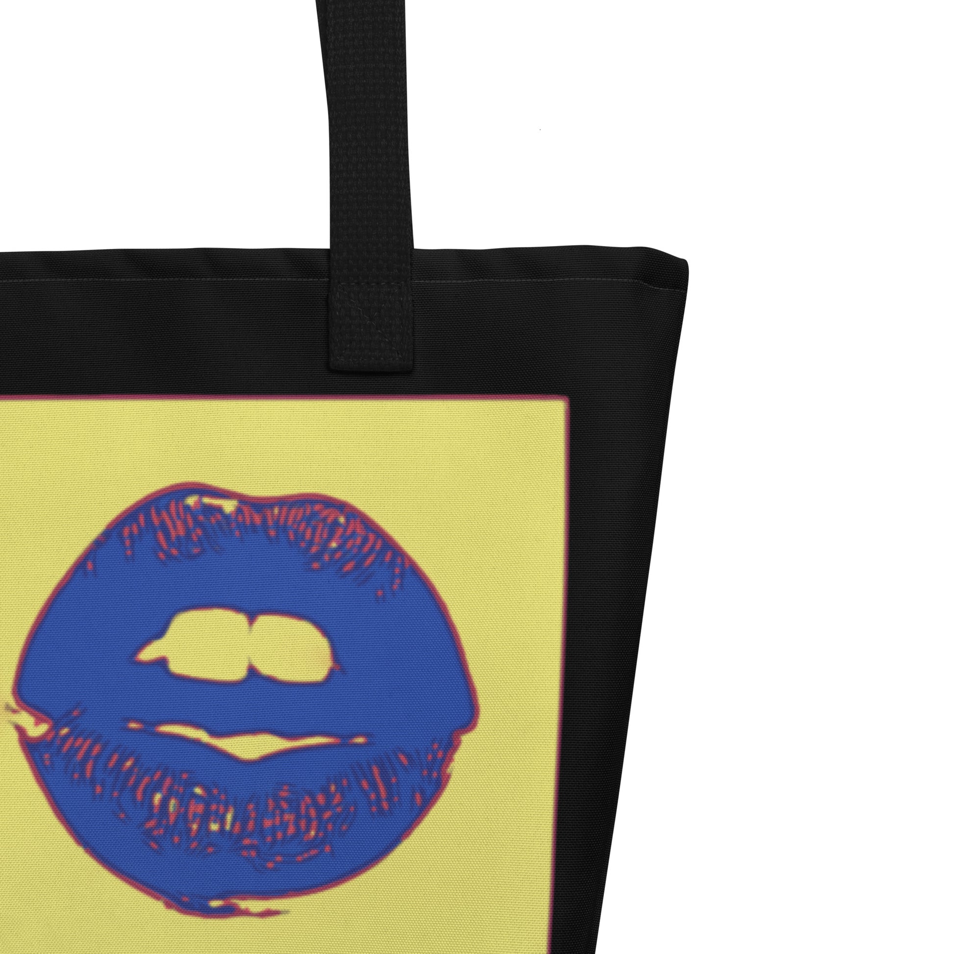 Tote bag with blue lips design on a yellow background