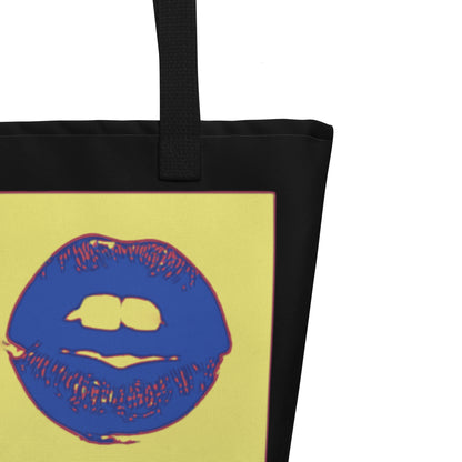 Tote bag with blue lips design on a yellow background