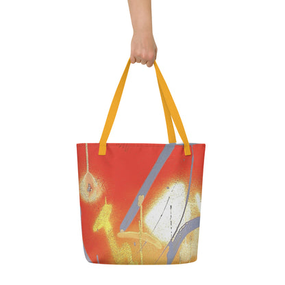 Tote bag with artistic design held by a hand on a white background