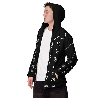 Person wearing a black hoodie with white face patterns on a white background