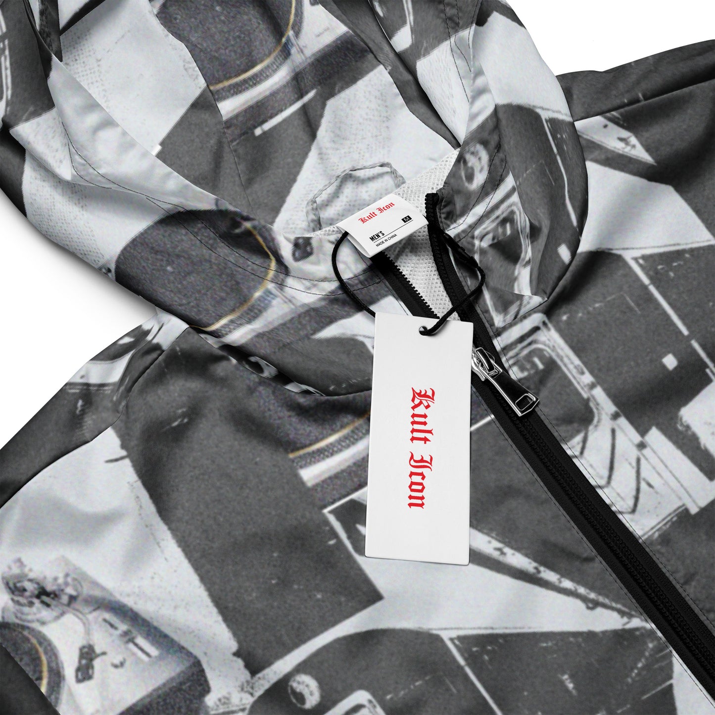 Black and white patterned jacket with a Kult Icon tag