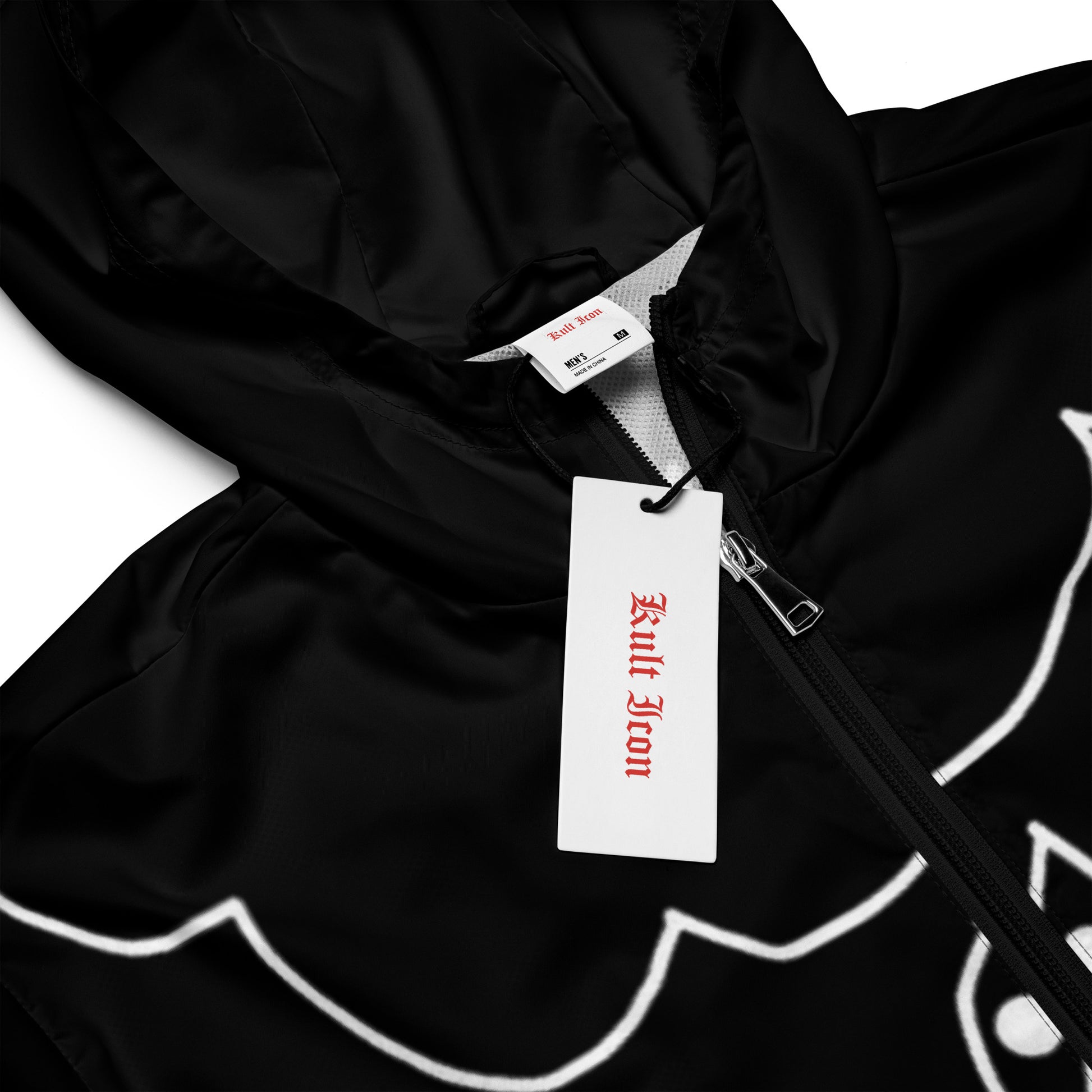 Black jacket with a brand tag on a white background