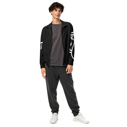 Man wearing a black tracksuit with white text on a white background