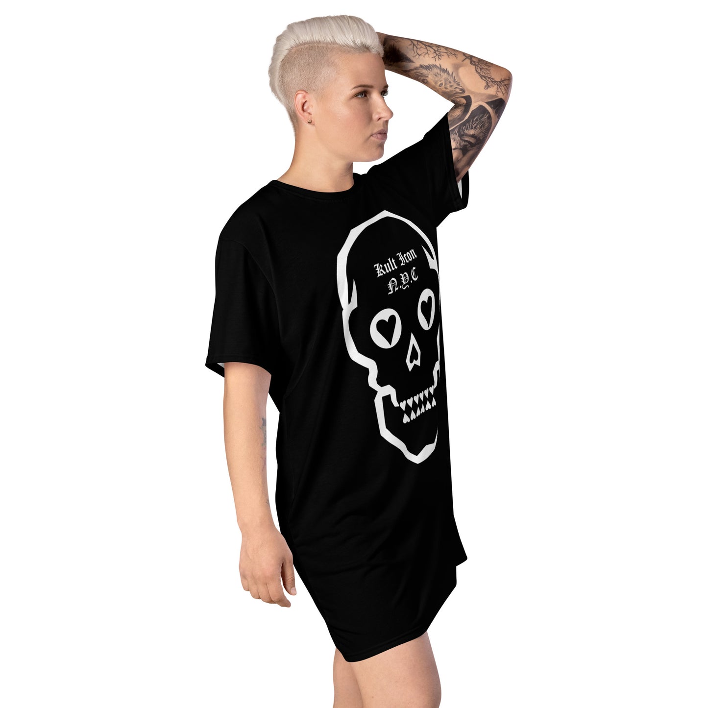 Person wearing a black t-shirt with a white skull design on a white background