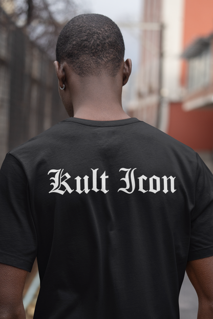 Person wearing a black t-shirt with 'Kult Icon' text on the back, standing in an urban setting.