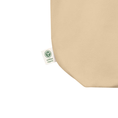 Beige fabric with a certified organic label on a white background