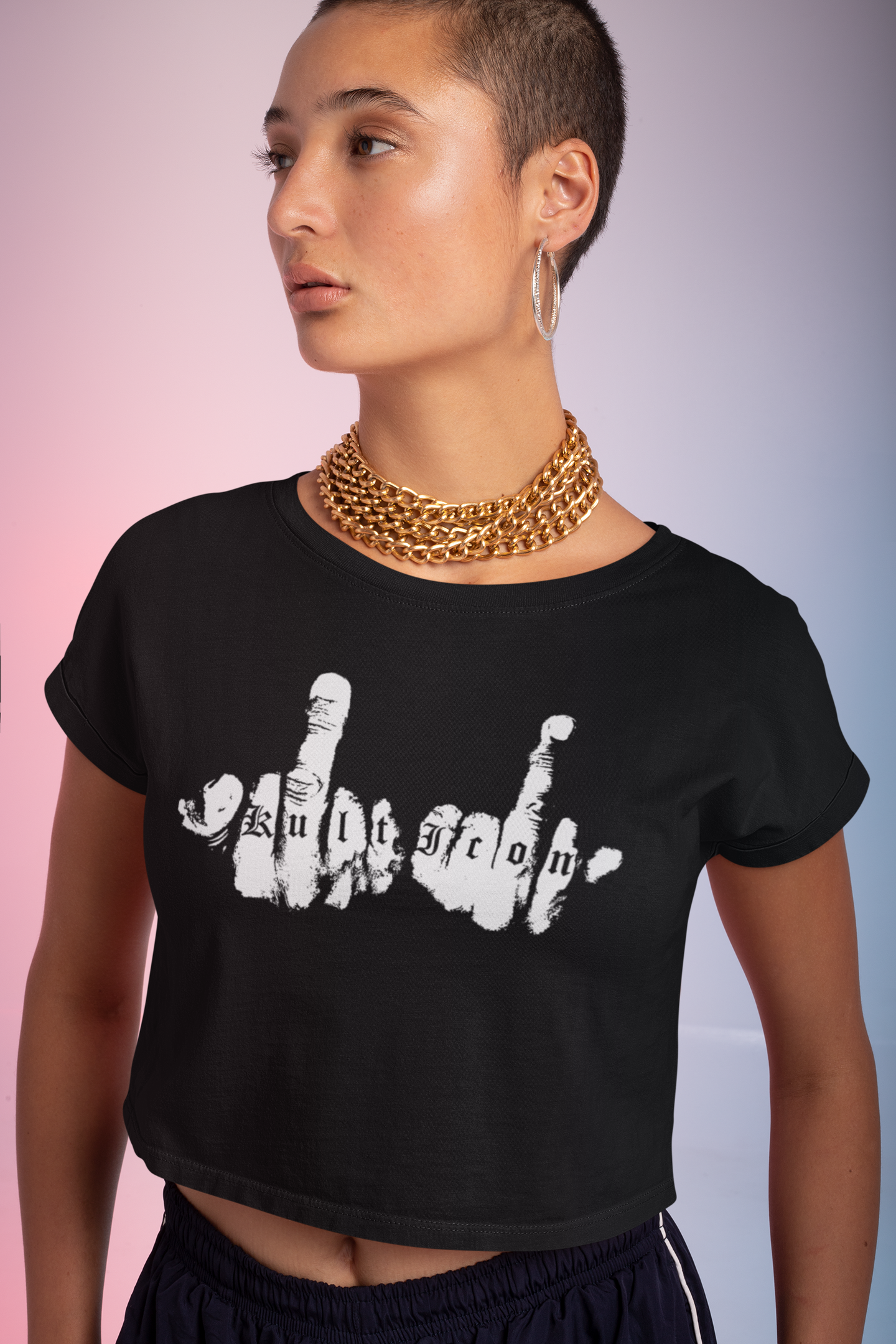 Person wearing a black t-shirt with white graphic design and text.
