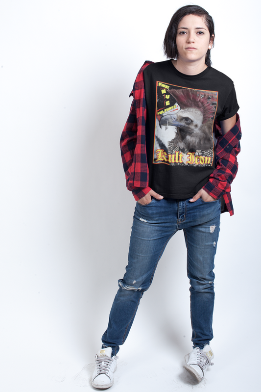 Person wearing a black graphic t-shirt, red plaid shirt, blue jeans, and white sneakers on a white background