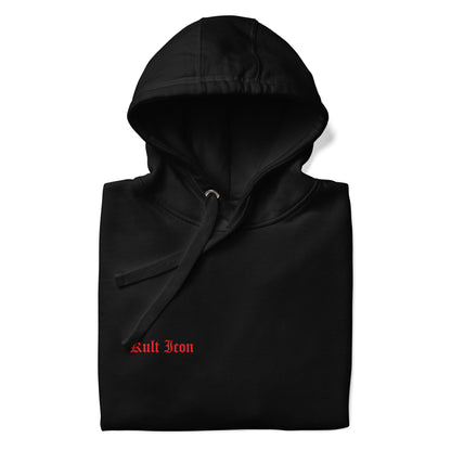 Black hooded garment with 'Kult Iron' text on a white background