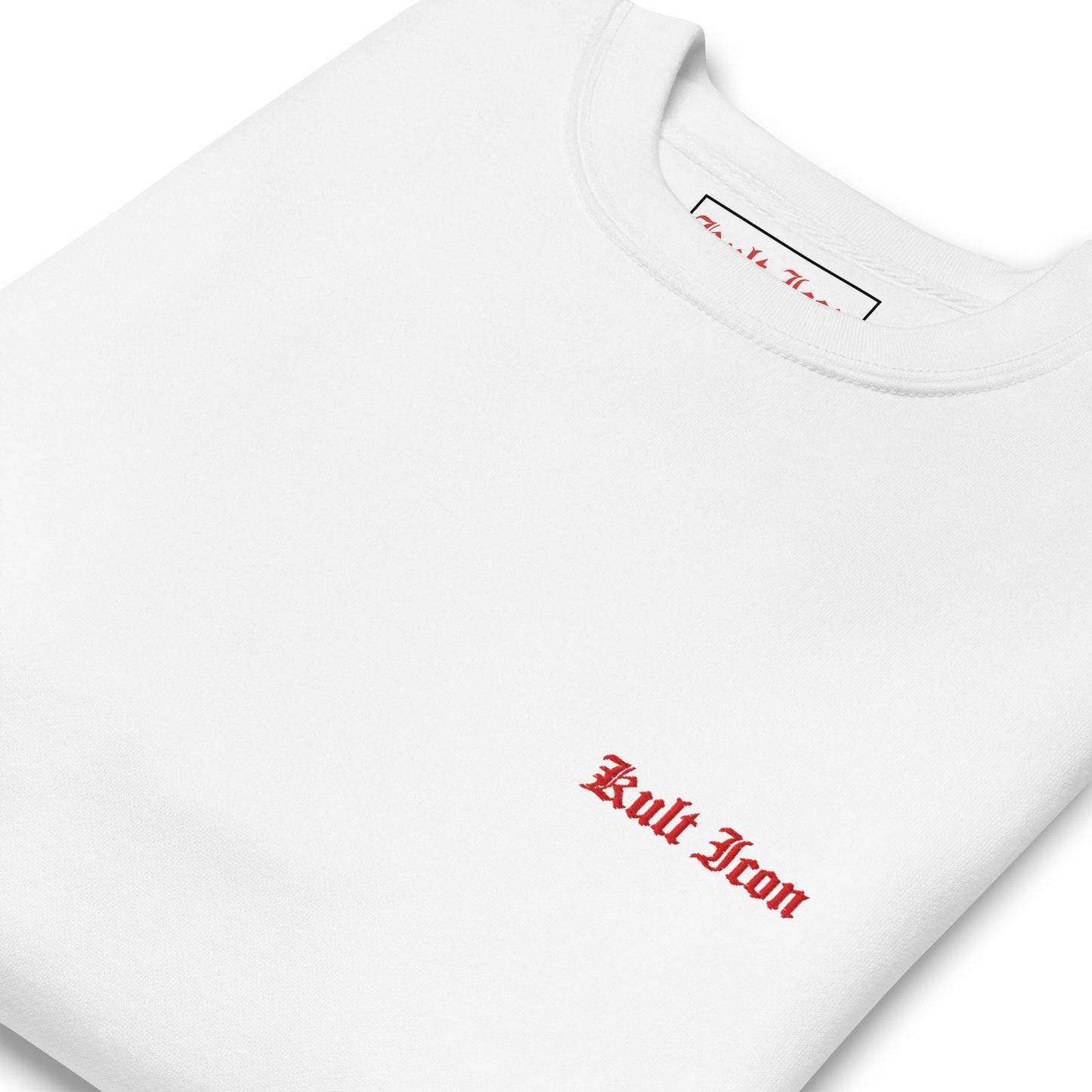 White t-shirt with red text 'Kult Iron' on a white background
