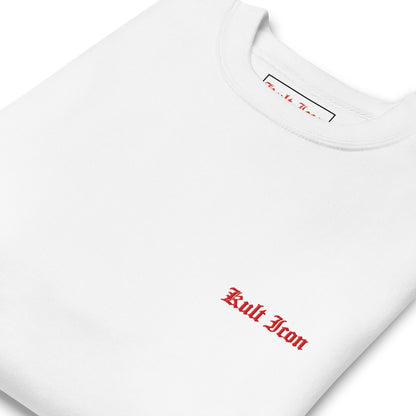 White t-shirt with red text 'Kult Iron' on a white background