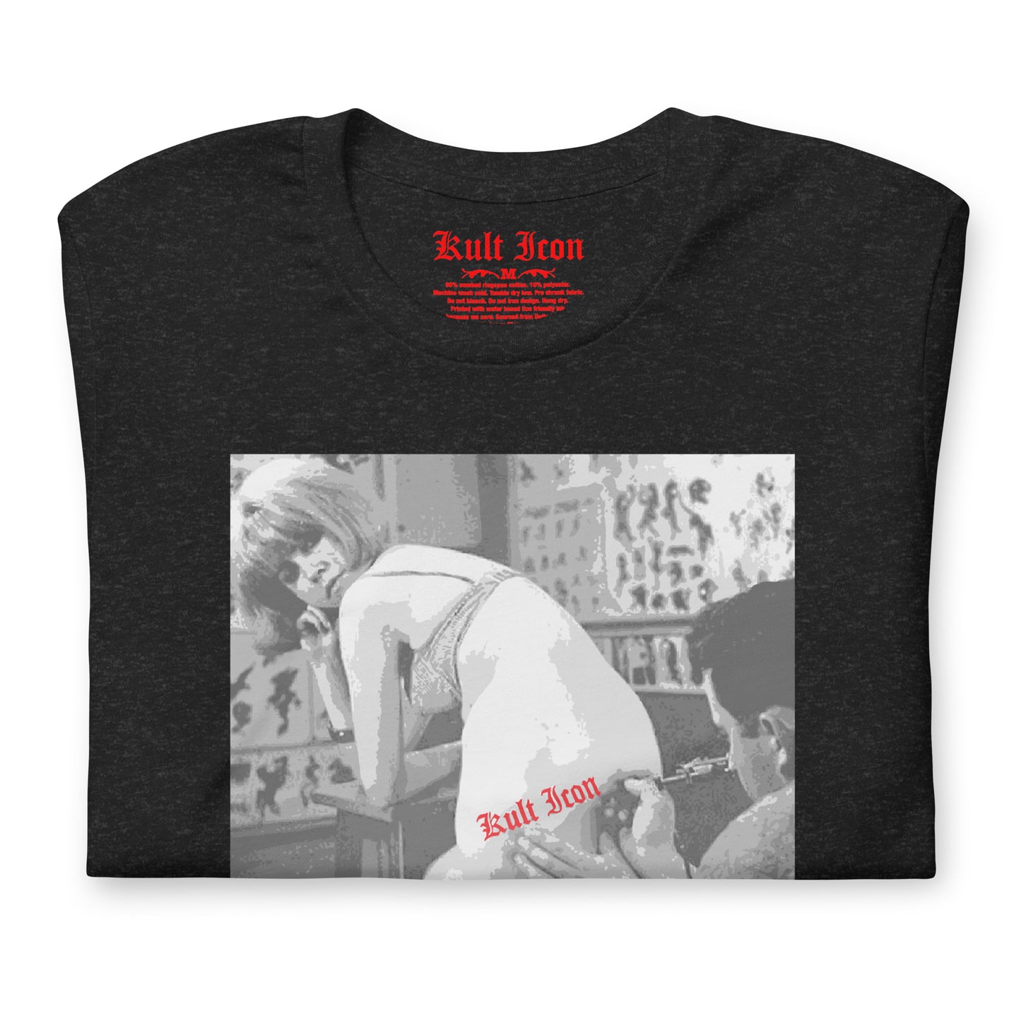 Folded black t-shirt with graphic design and 'Kult Iron' branding on a white background