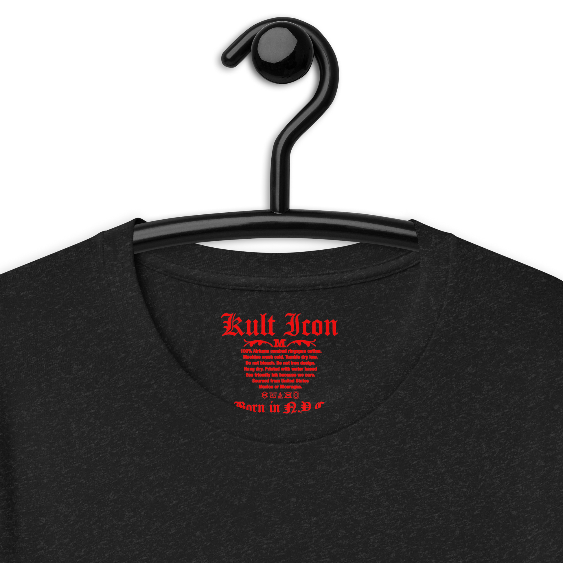 Black t-shirt with red text on a hanger against a white background